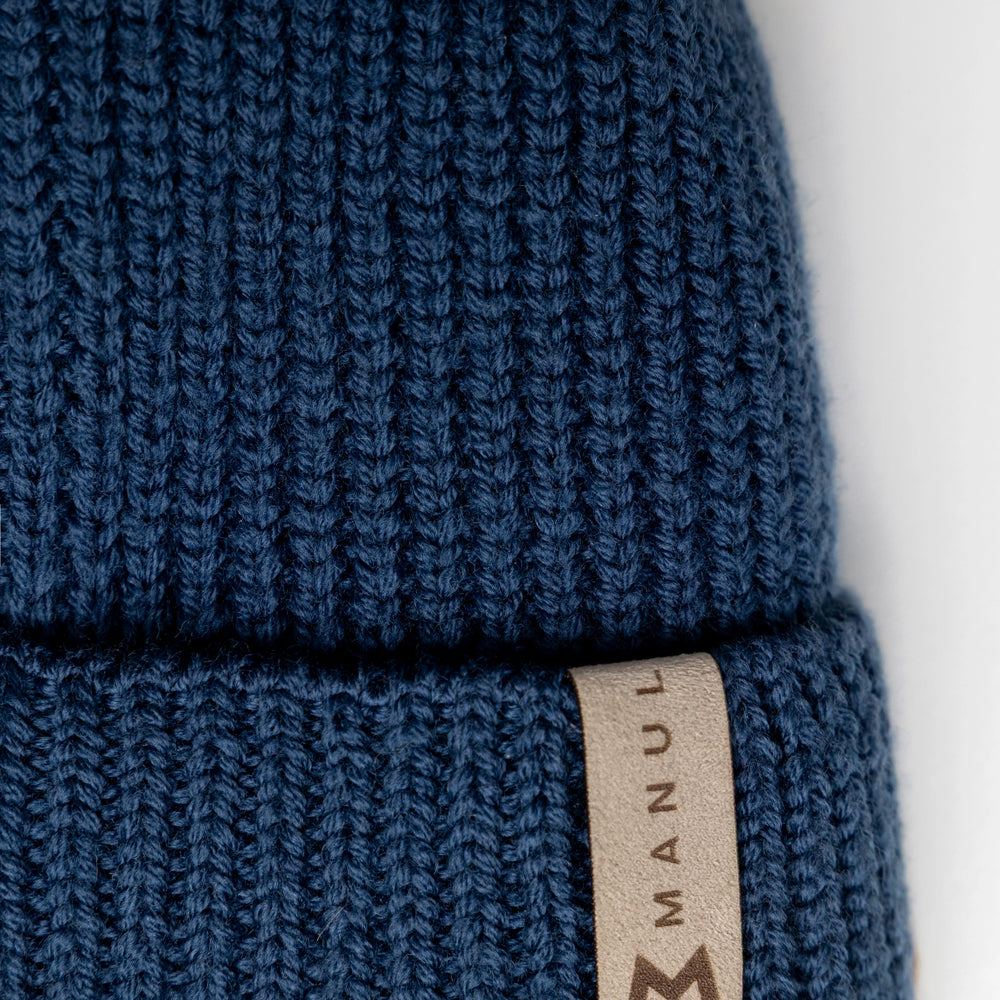 
                      
                        Winter beanie Navy — 100% extra fine merino wool, wool-fleece lined, reflective pom-pom
                      
                    