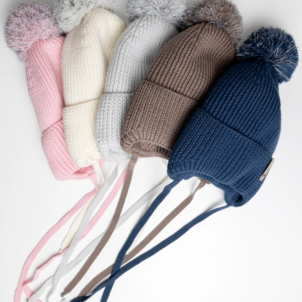 
                      
                        Winter beanie Vanilla — 100% extra fine merino wool, wool-fleece lined, reflective pom-pom
                      
                    