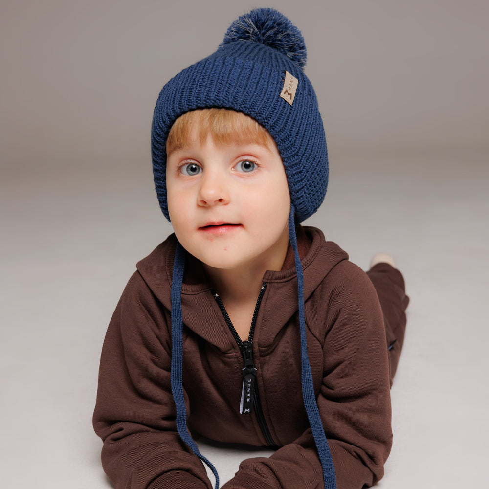 
                      
                        Winter beanie Navy — 100% extra fine merino wool, wool-fleece lined, reflective pom-pom
                      
                    
