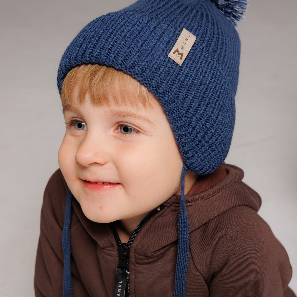 
                      
                        Winter beanie Navy — 100% extra fine merino wool, wool-fleece lined, reflective pom-pom
                      
                    