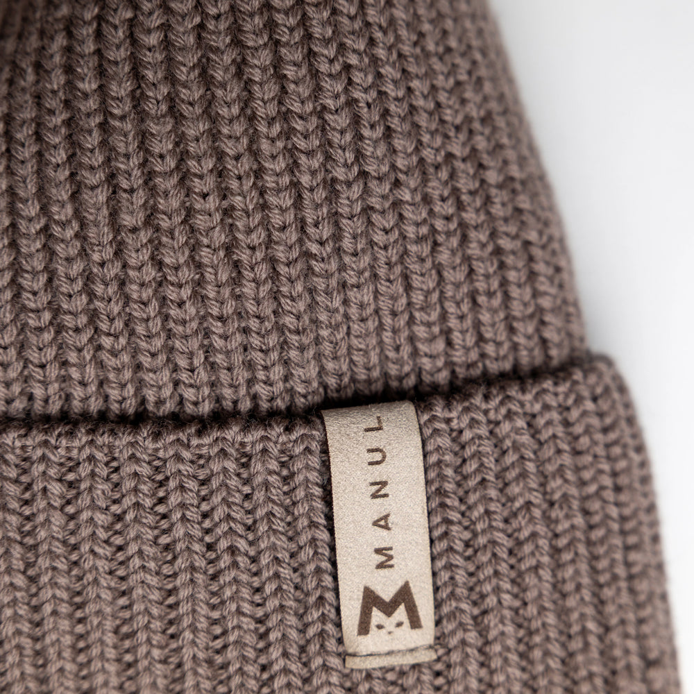 
                      
                        Winter beanie Mocha — 100% extra fine merino wool, wool-fleece lined, reflective pom-pom
                      
                    